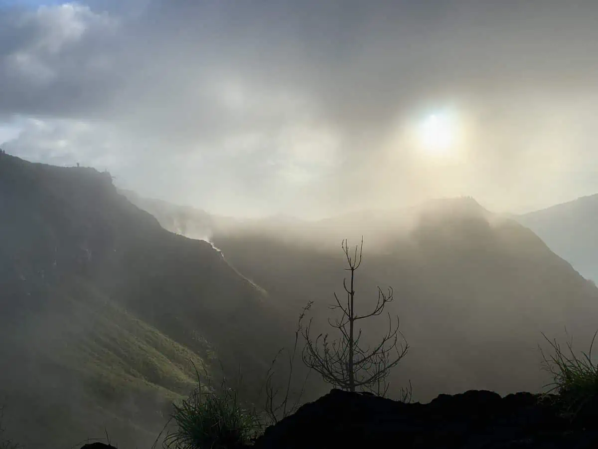 Clouds gather at the top of Mount Batur at sunrise