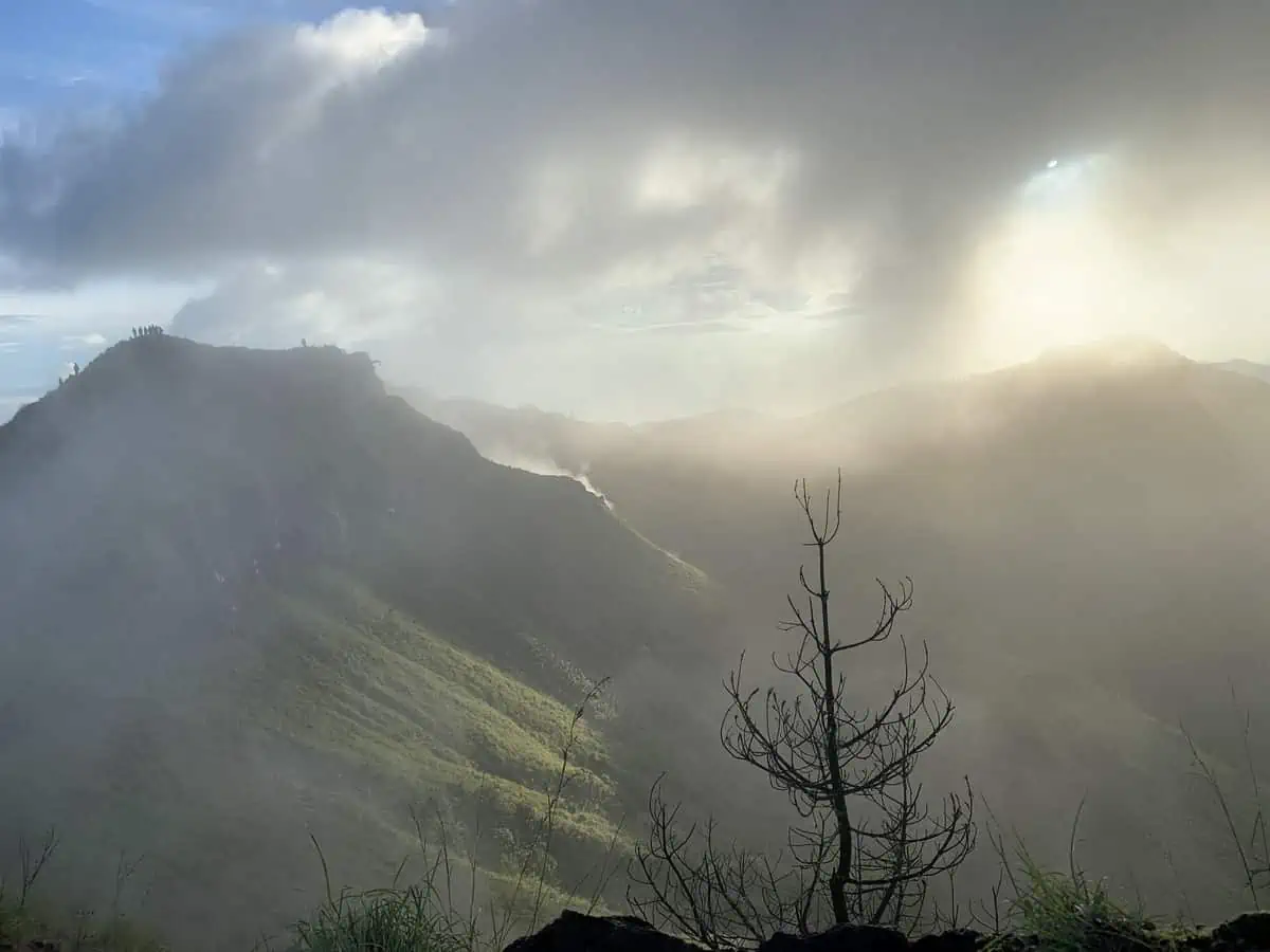 clouds covering the top of mount batur central bali