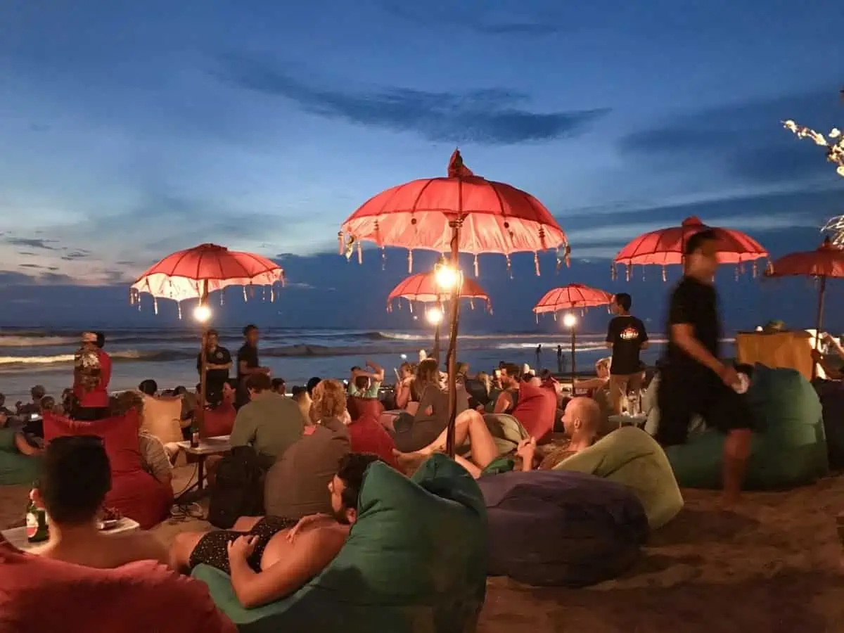 Bali vs Hawaii: An Honest Comparison in 2025 23 A-People-on-Bali-Beach-at-Night