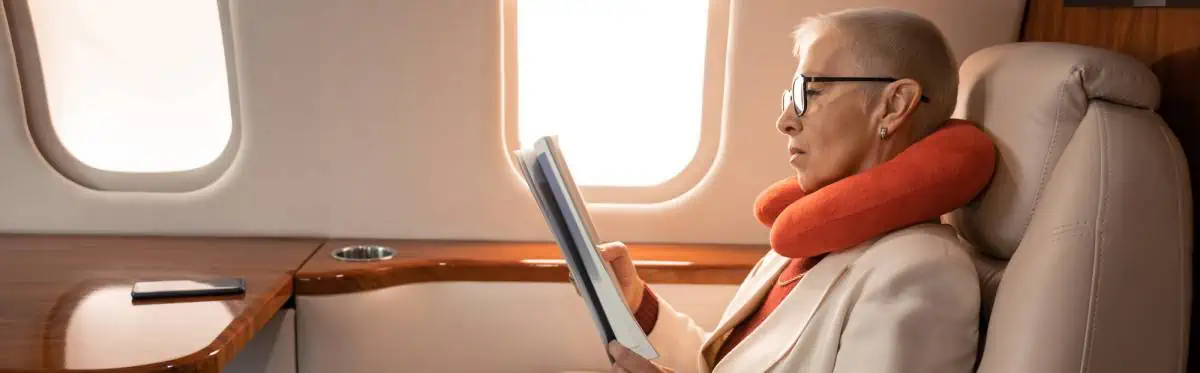 A-Business-Woman-Reading-Magazine-in-Airplane