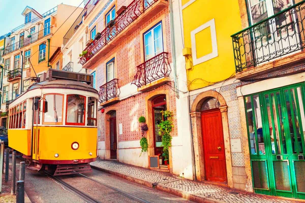 34 Cheap Places to Travel in 2025 | Best Budget Destinations 8 A-Vintage-Yellow-Tram-on-the-Lisbon-Street