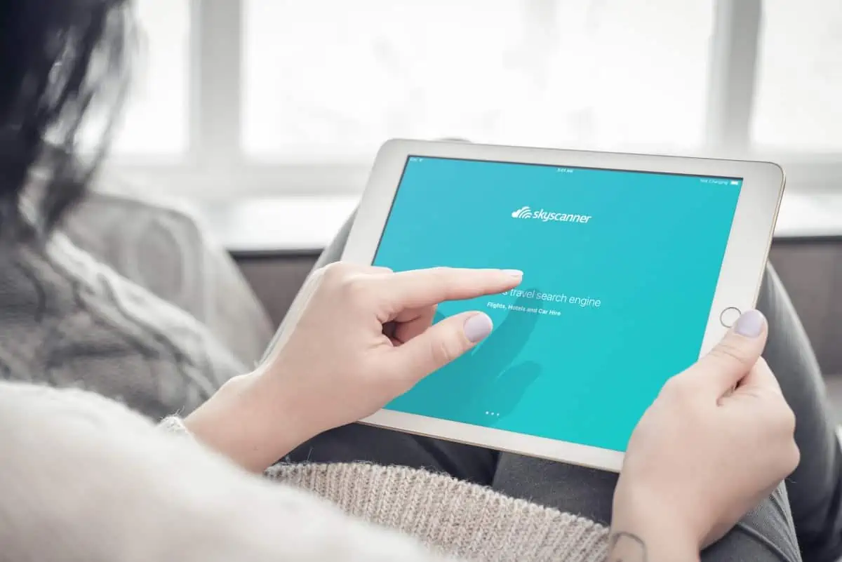 Woman-Using-Skyscanner-App-in-Tablet